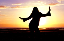 Woman blissing out on the beach